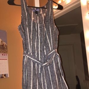 Grey and white striped jumpsuit.